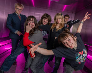 Festival Logo Man/Woman/Chainsaw